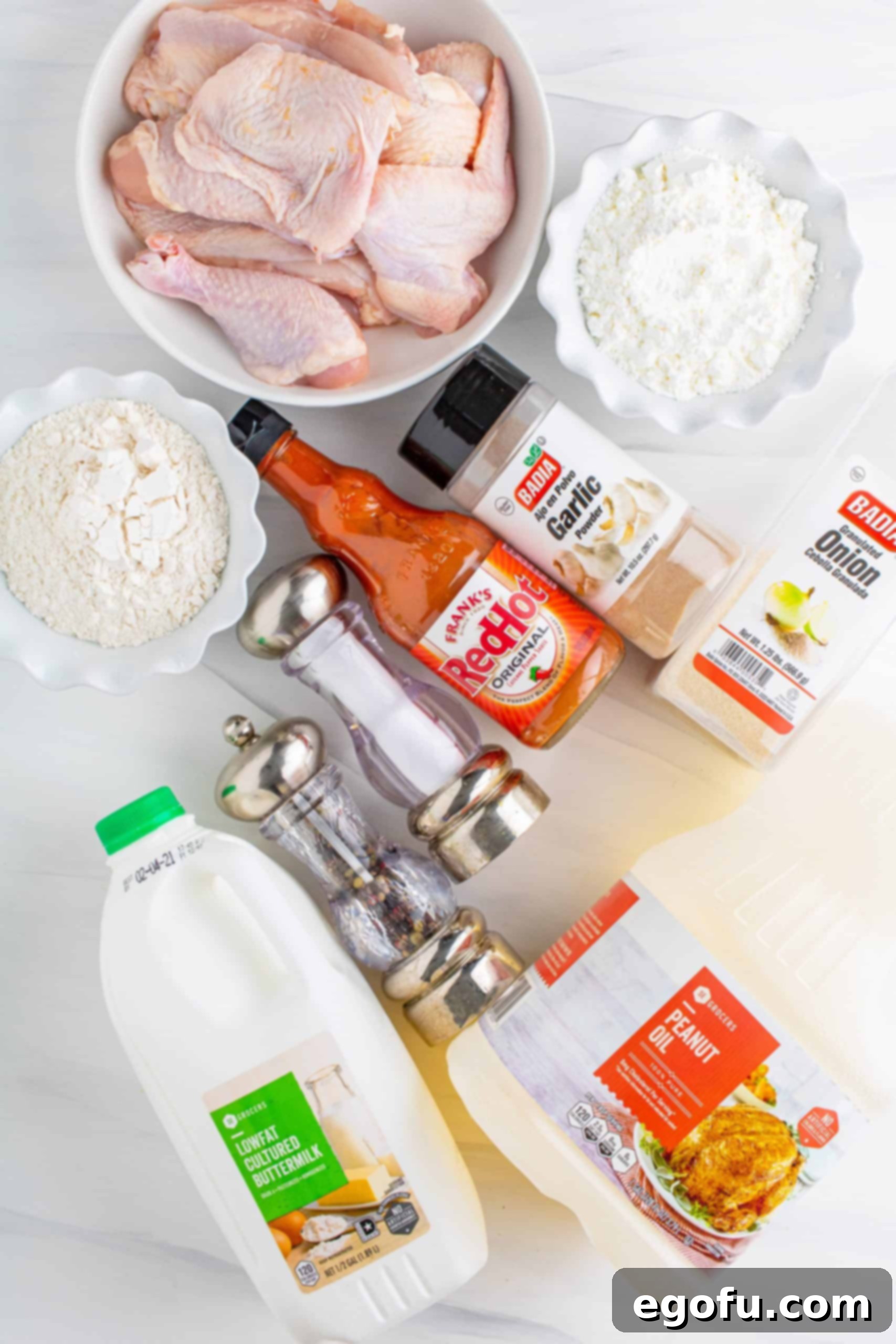 Ingredients needed to make The Best Southern Fried Chicken: chicken, salt, garlic powder, onion powder, buttermilk, hot sauce, flour, cornstarch, black pepper.