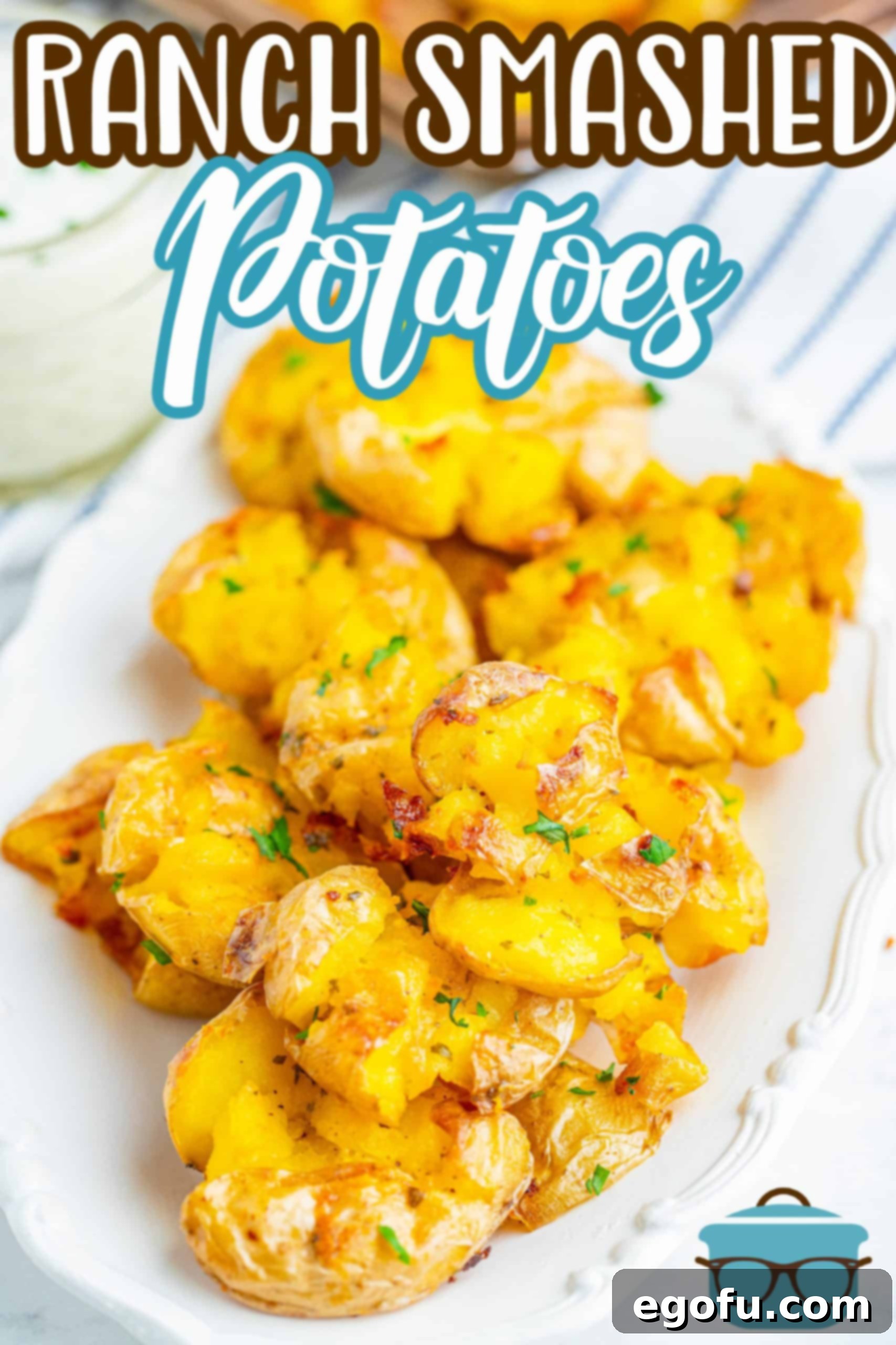 Ranch Smashed Potatoes on white platter layered.