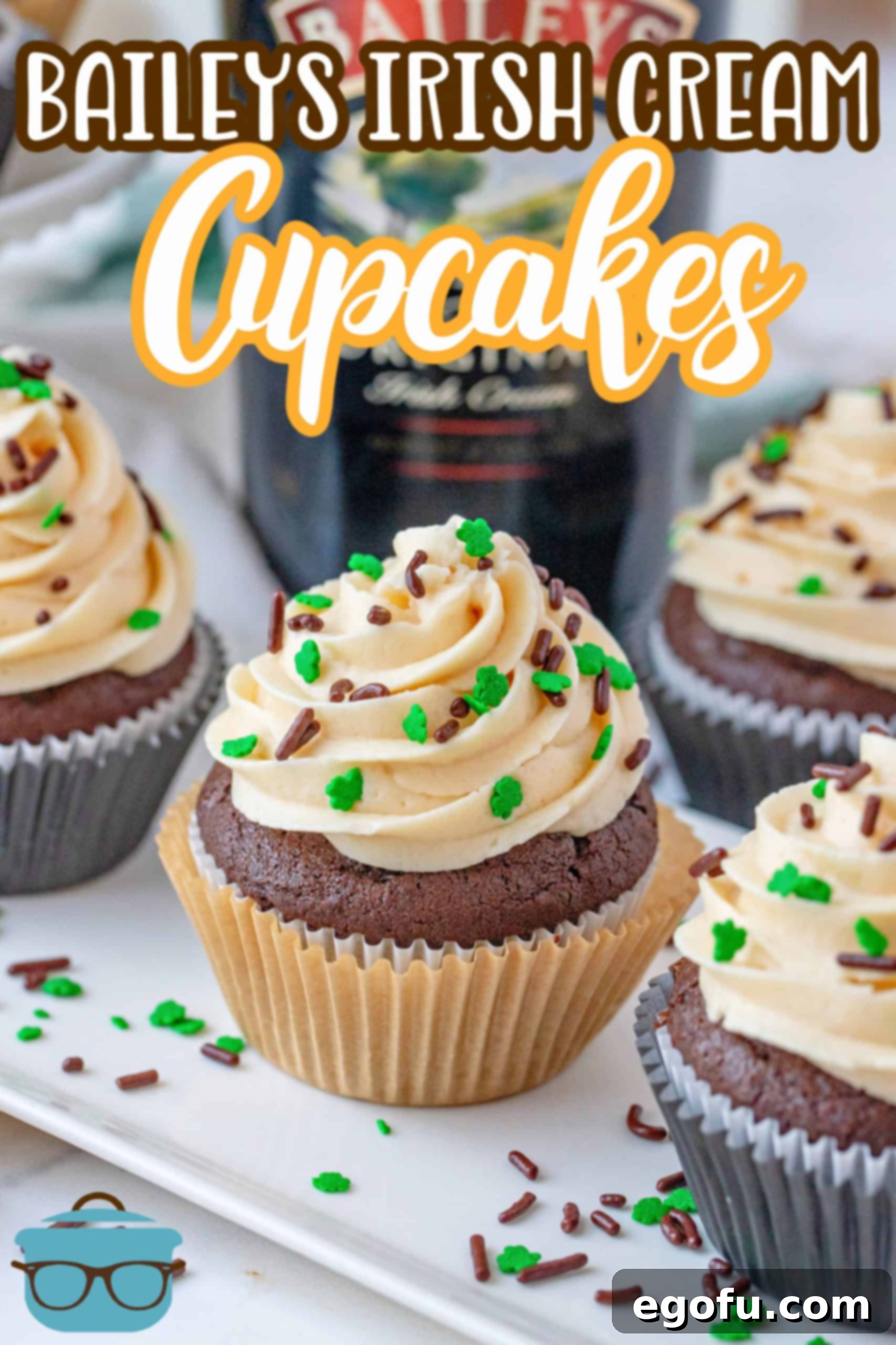 Decadent Baileys Cupcakes 3 Three Homemade Baileys Cupcakes elegantly arranged on a white platter, ready to be enjoyed.