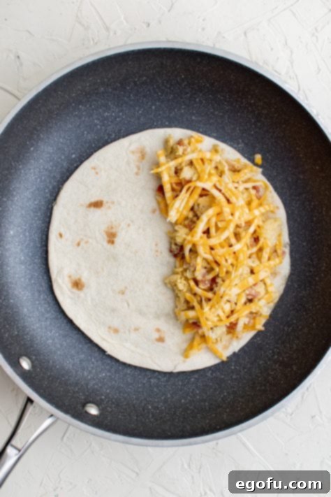 Cheese topped over egg and cheese mixture