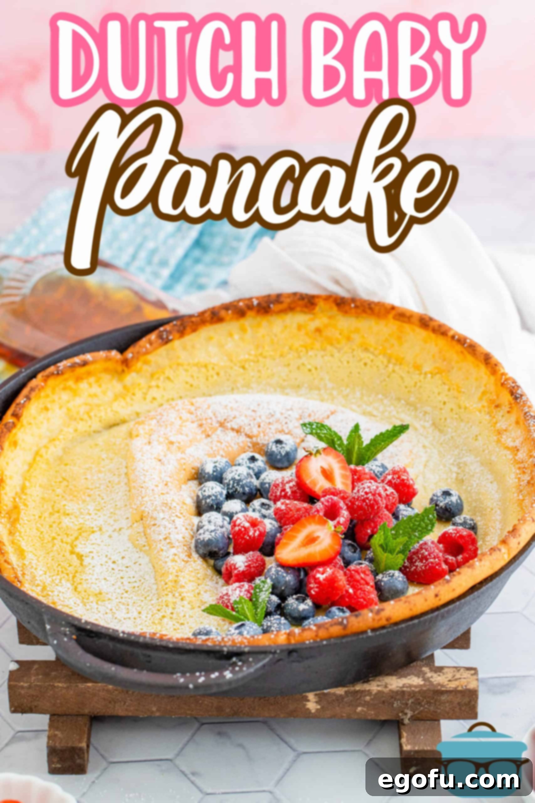 Oven Baked Cloud Pancake 3 Finished Dutch Baby Pancake topped with powdered sugar and fruit pinterest image.