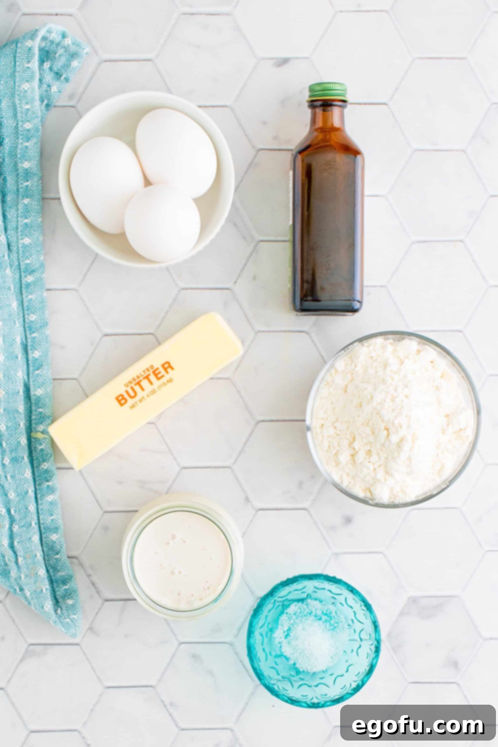 Oven Baked Cloud Pancake 4 Ingredients needed to make a Dutch Baby Pancake: butter, eggs, flour, coffee creamer, vanilla extract and salt.