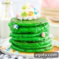 Stacked Green Pancakes with toppings square image for St. Patrick's Day
