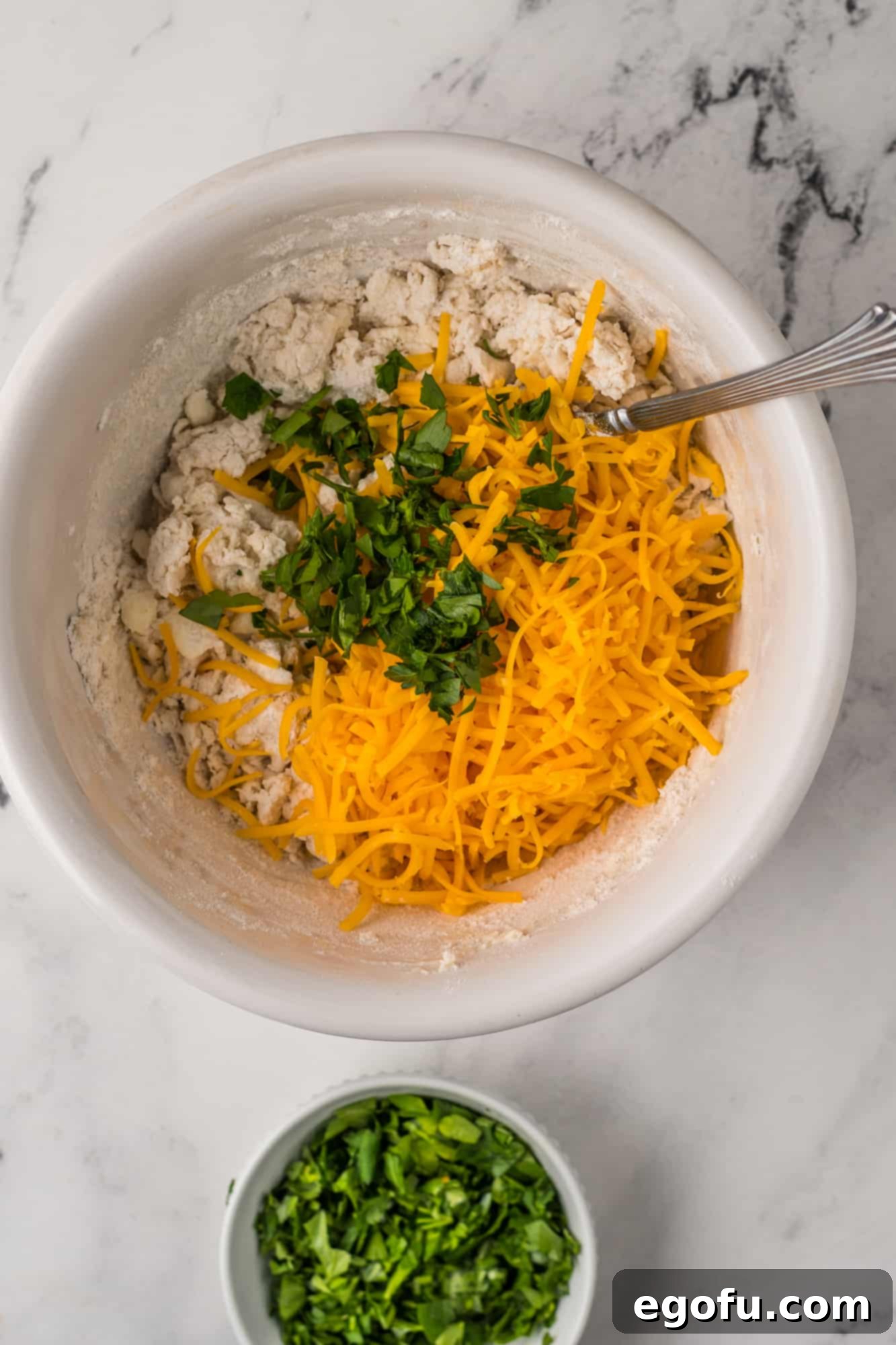 Cheddar and parsley added to dumpling mixture.