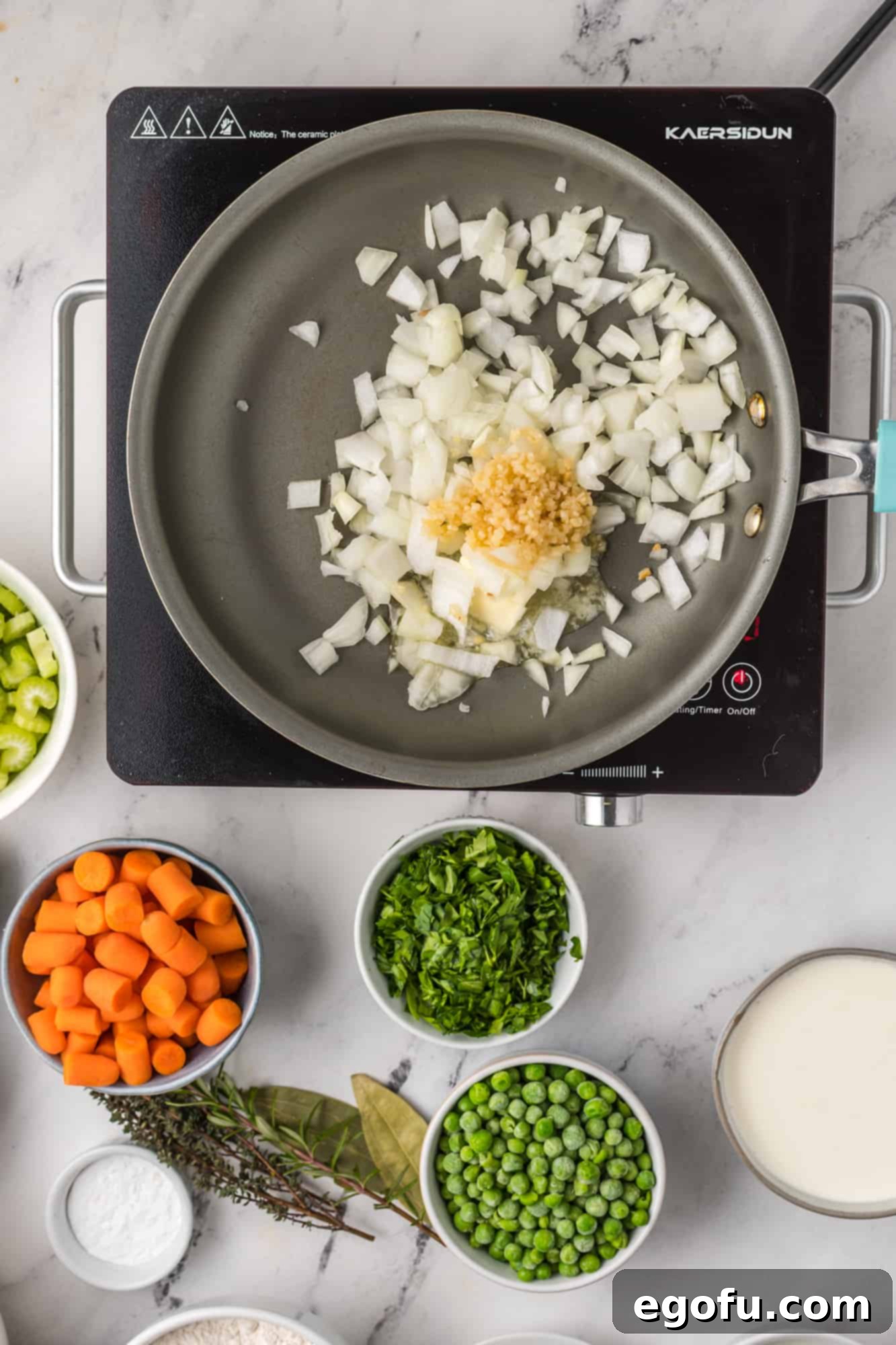 Butter, onions and garlic in pan.