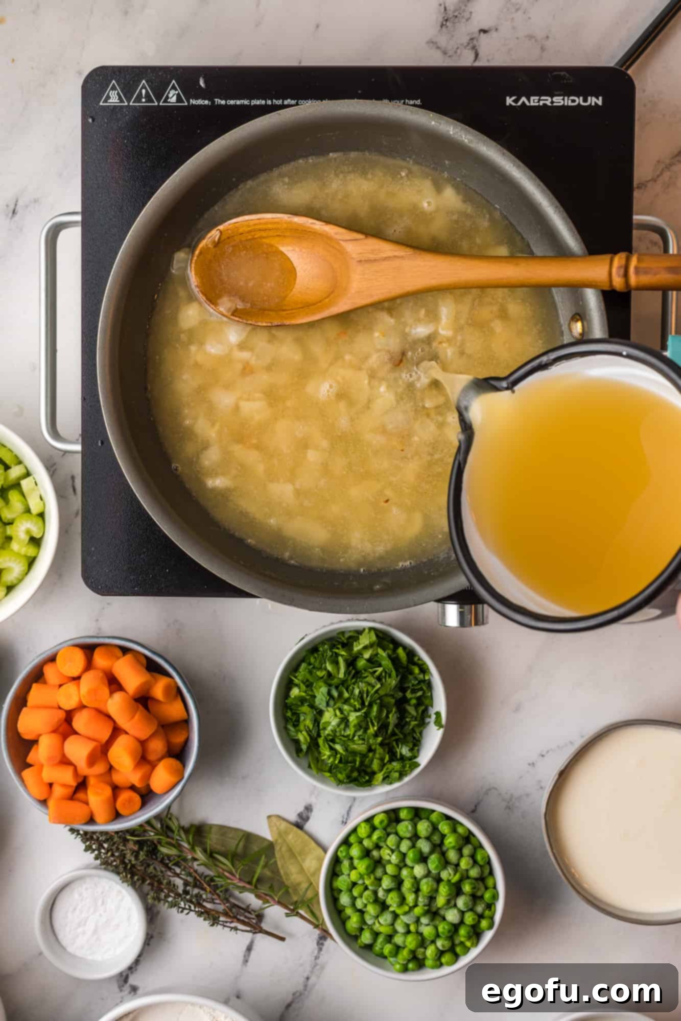 Broth being added to onion and flour mixture.