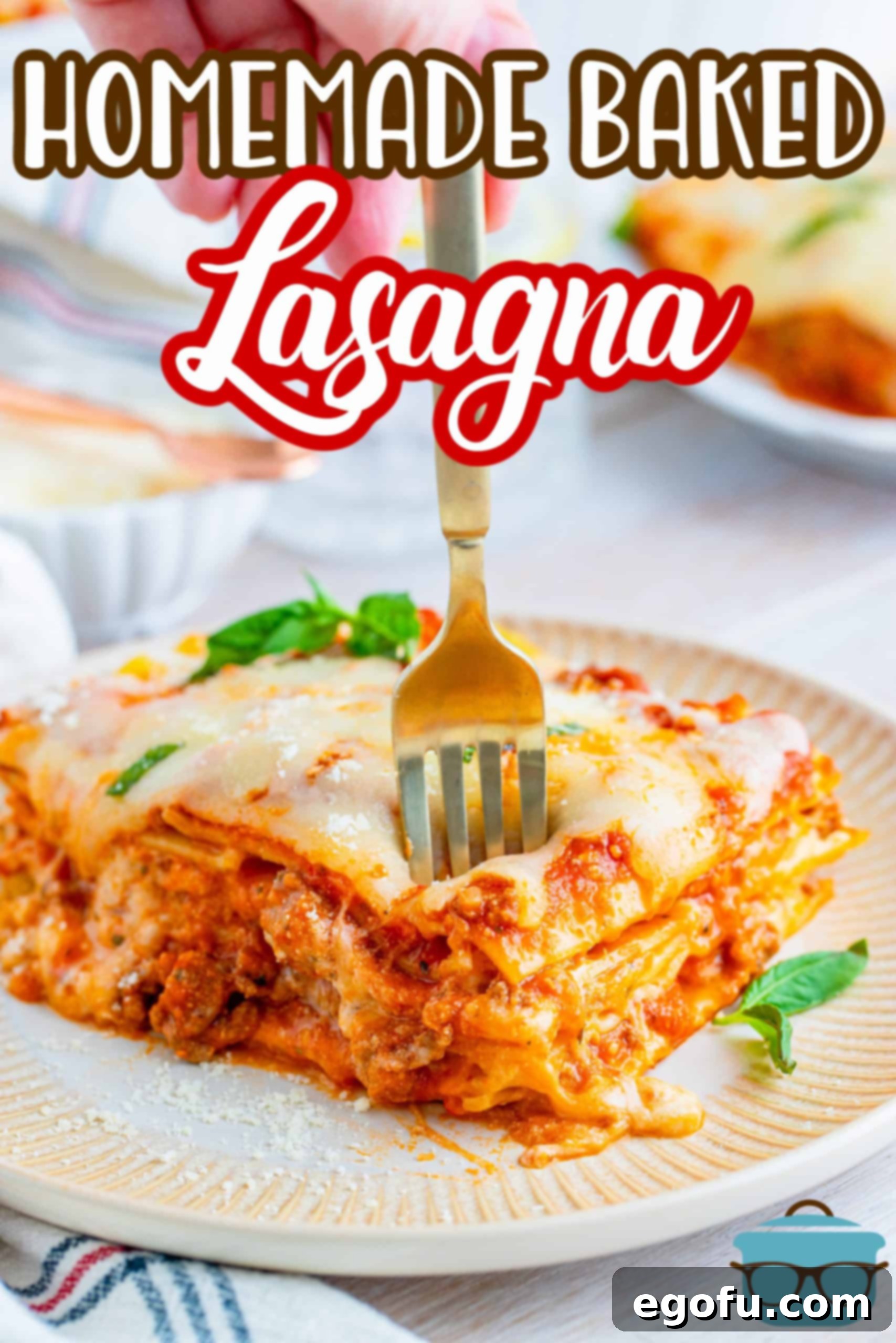 Hearty Homemade Lasagna Bake 4 Fork going into slice of Homemade Baked Lasagna Recipe, image with text that says Homemade Baked Pasta.
