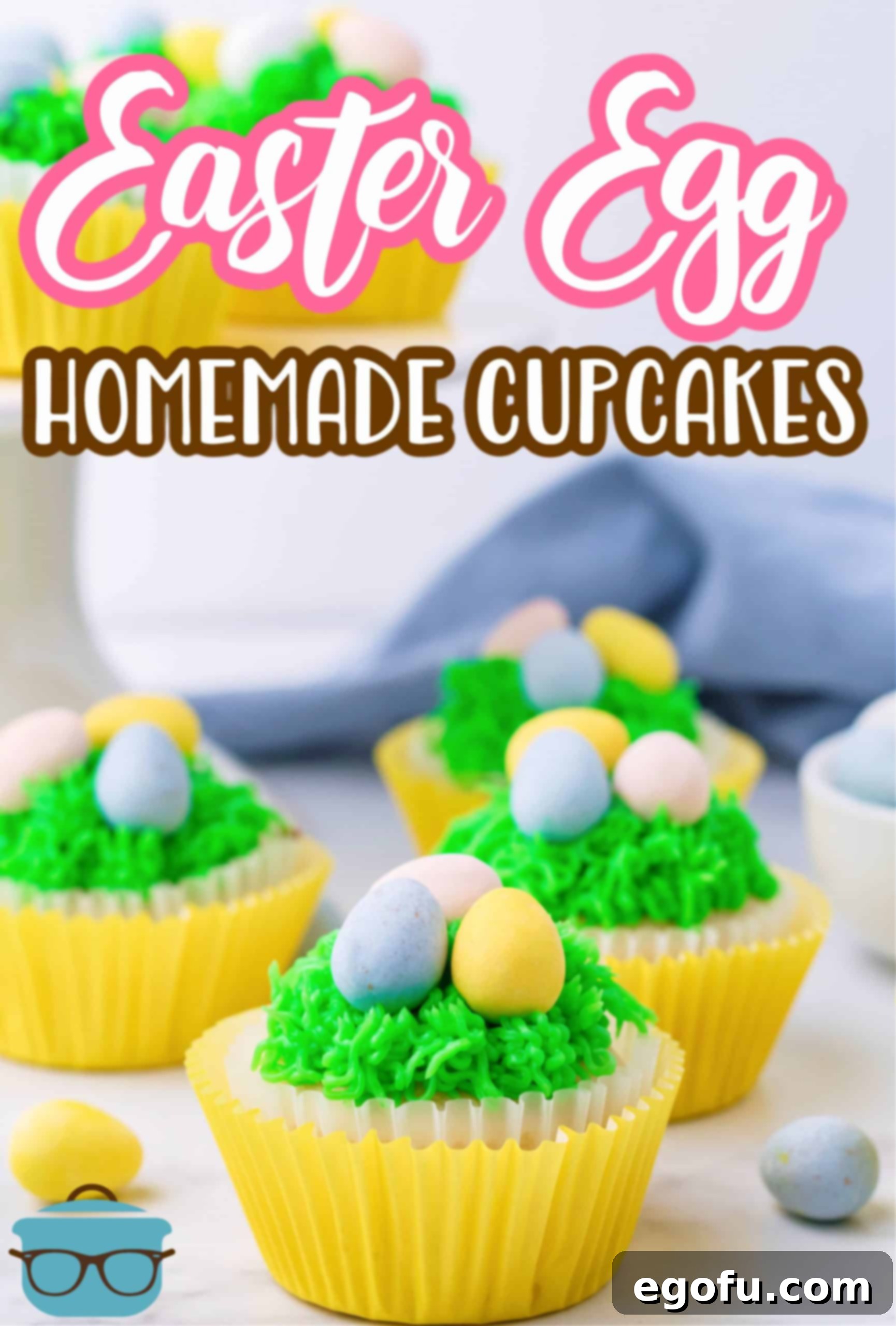 A charming display of multiple decorated Easter Egg Cupcakes arranged on a stylish marble surface.