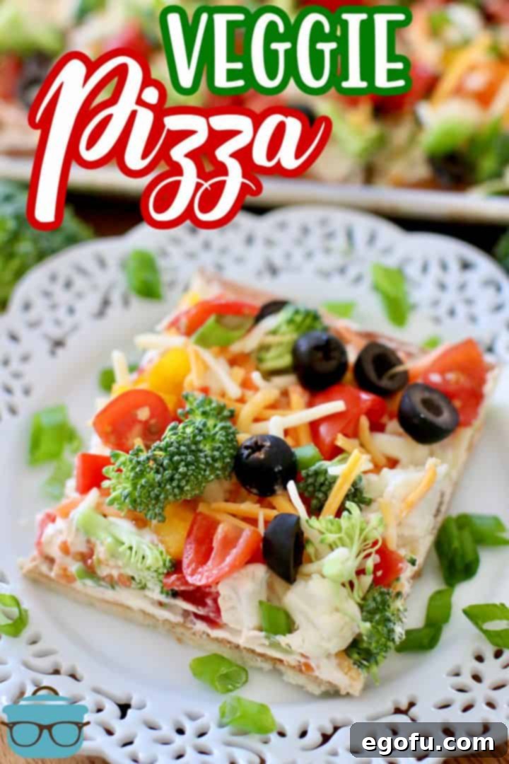 Easy Veggie Pizza recipe from The Country Cook, slice of pizza shown on a white plate