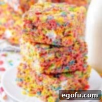 Stacked treats on white plate square image