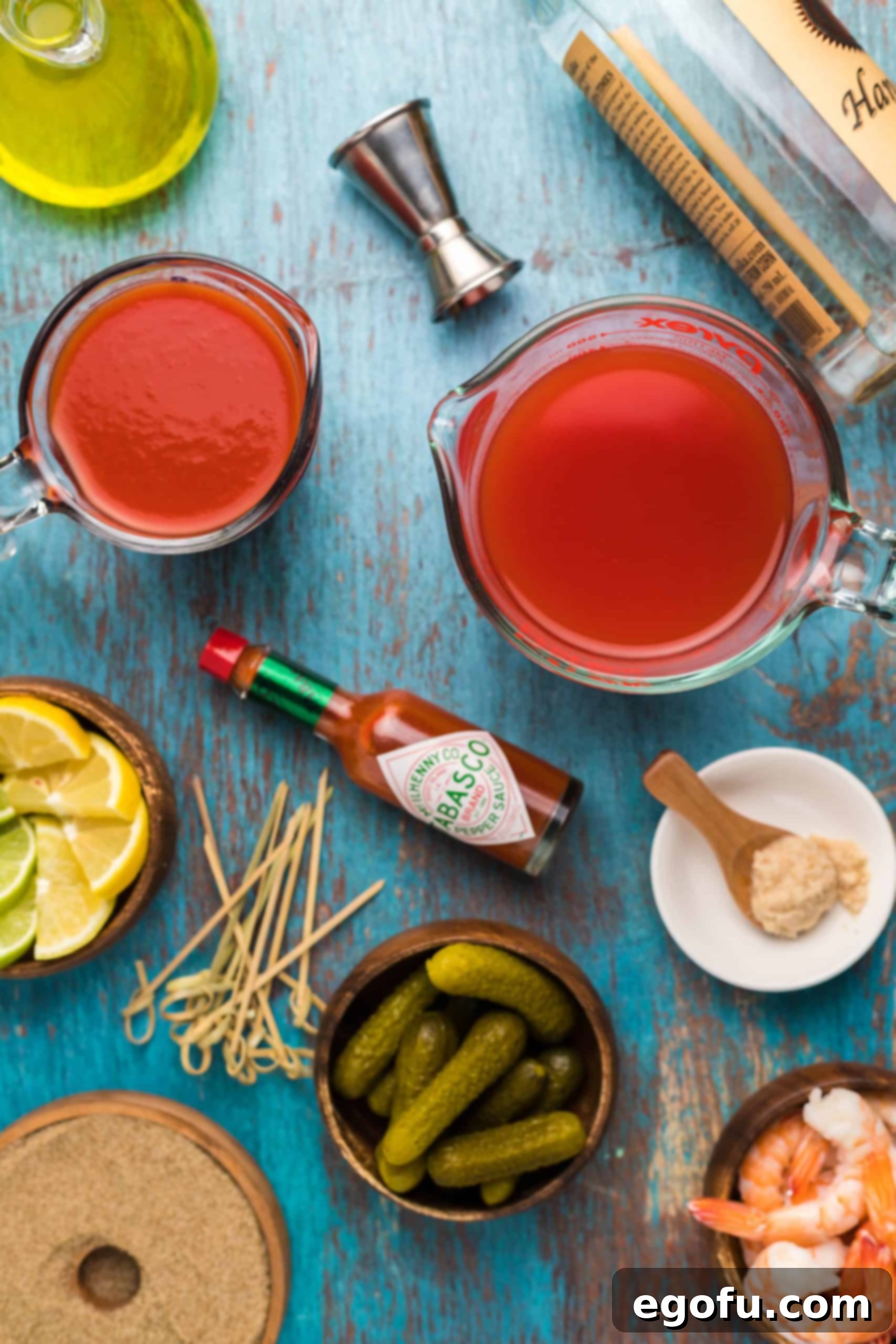 Signature Bloody Mary Blend 3 Ingredients needed: clamato juice, tomato juice, pickle juice, lemon juice, lime juice, horseradish, celery salt, hot sauce, vodka, lemon slices. lime slices, pickles and cocktail shrimp.