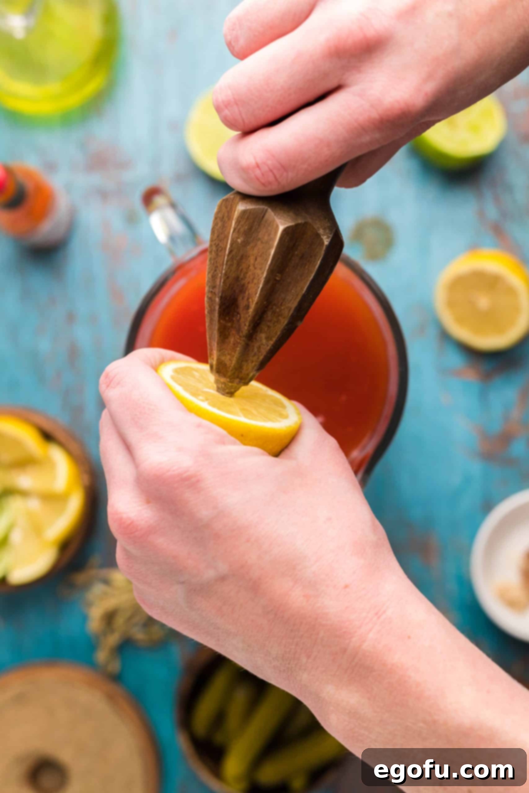 Signature Bloody Mary Blend 9 lemon being juiced.