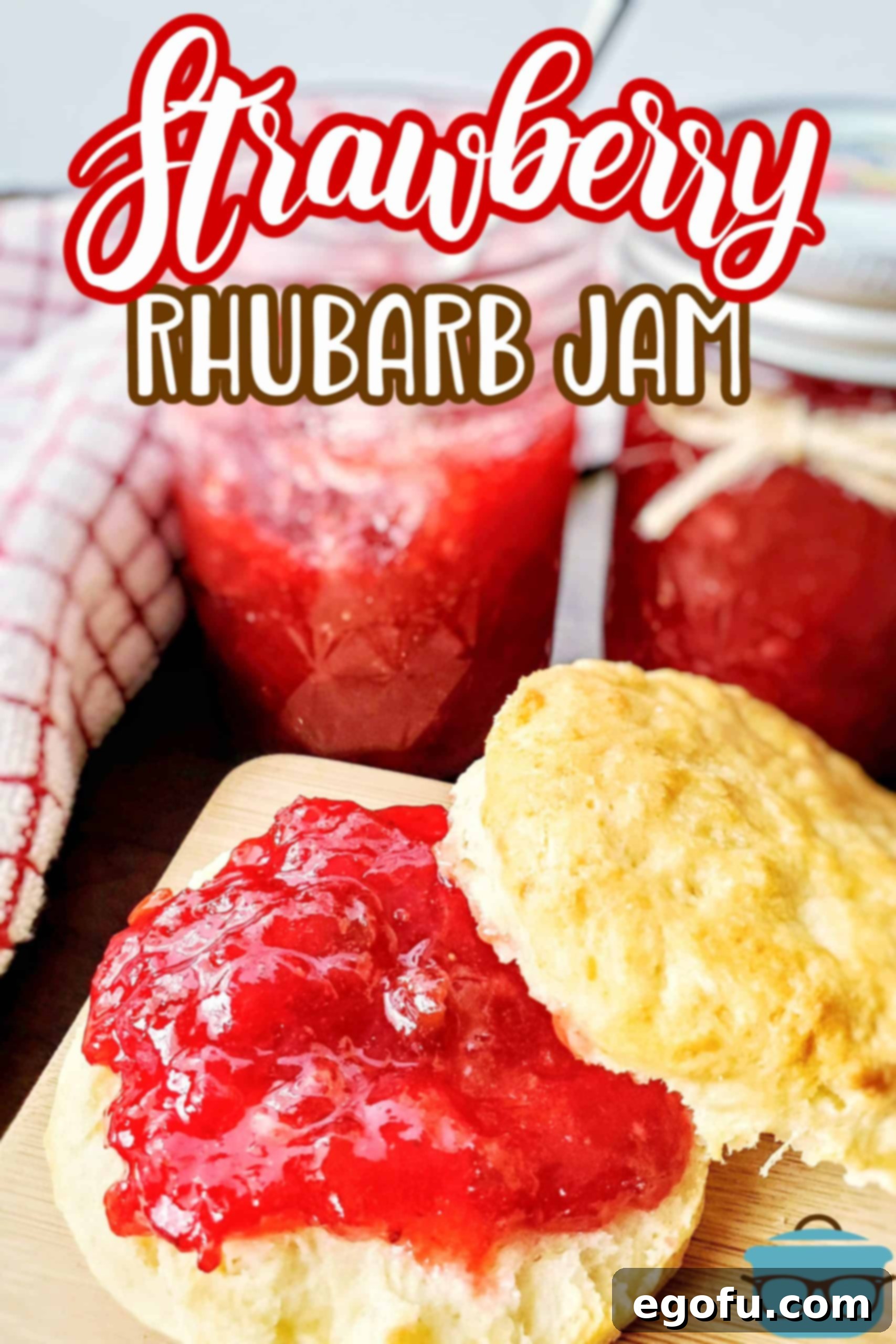 Overhead shot of Strawberry Rhubarb Jam in a jar, presented on a rustic surface next to fresh strawberries and rhubarb stalks, with text overlay for Pinterest.