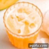 Melon Breeze 9 Close up of Agua de Melon over ice in glass