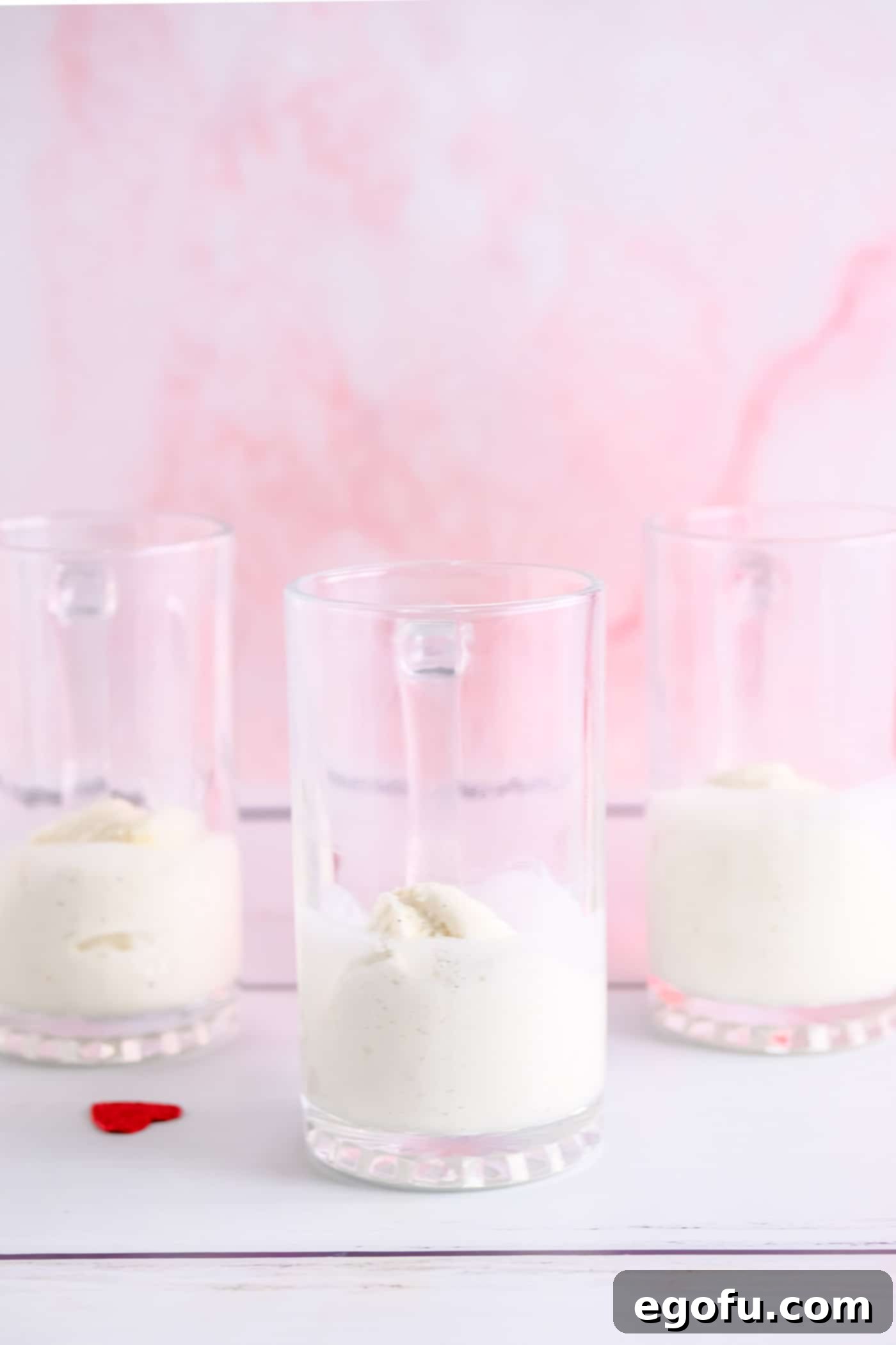 Ice cream added to three glasses.