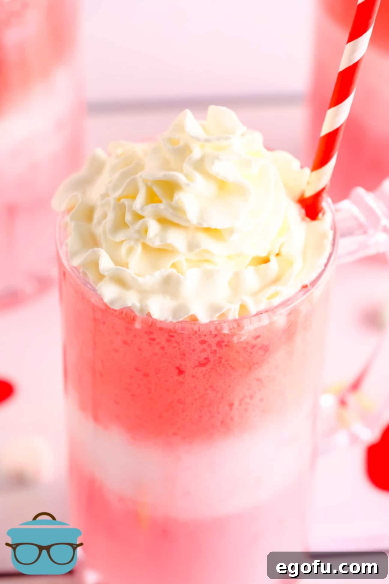 Finished Strawberry Cream Float topped with whipped cream close up.