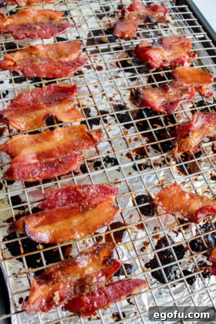 Finished Pig Candy out of oven on wire rack over baking sheet.