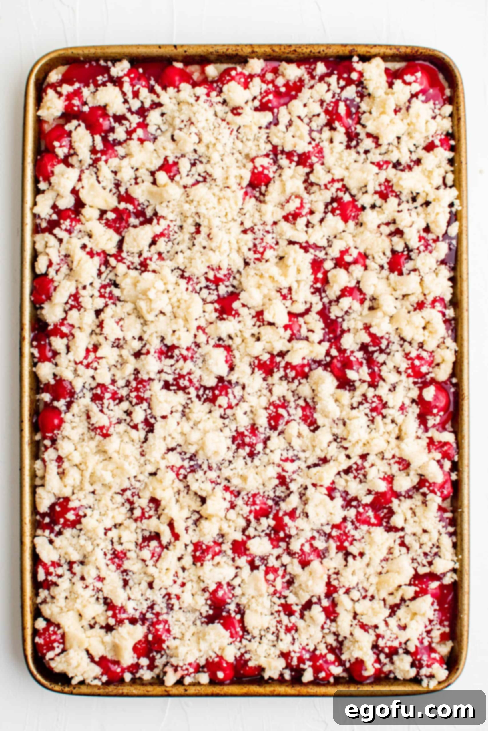 Golden Cherry Crumble Bars 11 Remaining crust and crumble mixture sprinkled over the top of the cherry pie filling.