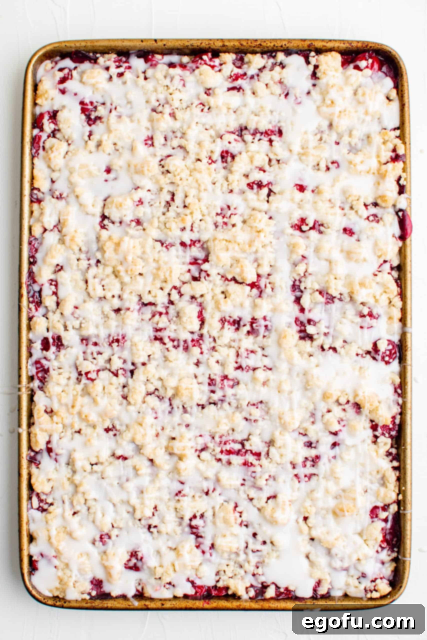 Golden Cherry Crumble Bars 13 Cherry Crumble Bars finished in pan covered in glaze.