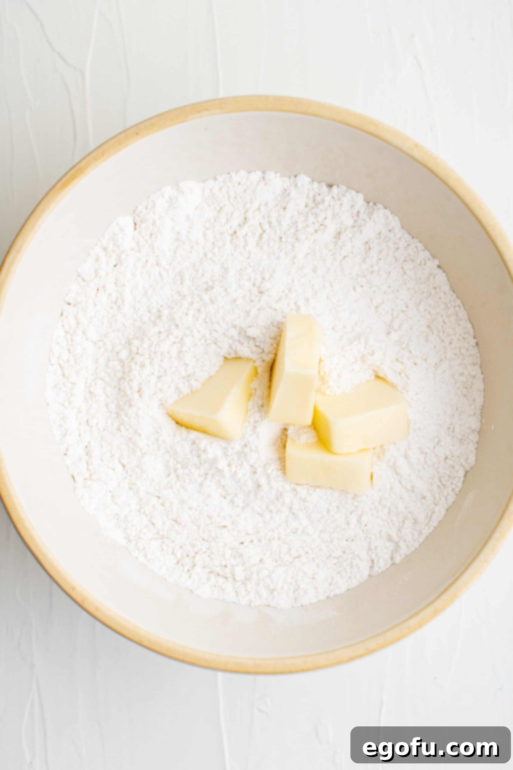 Golden Cherry Crumble Bars 5 Flour, sugar, baking powder, salt and butter in bowl.