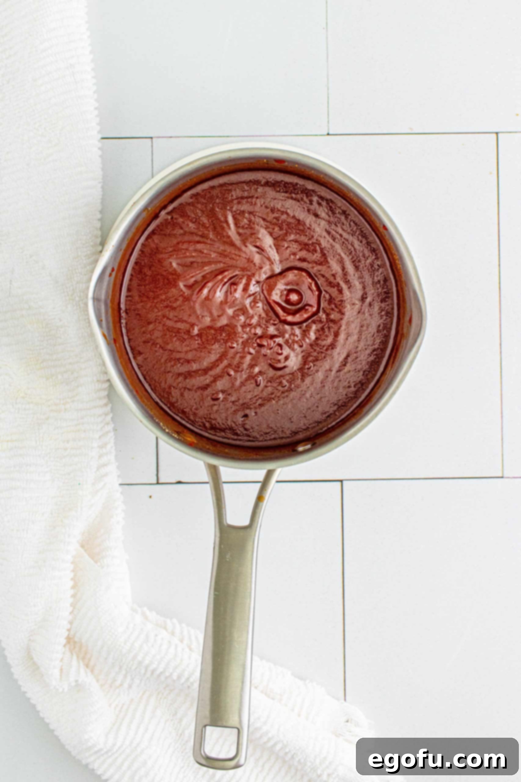 Homemade BBQ Sauce cooling in metal saucepan