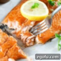 Square image of the Smoked Salmon finished with fork pulling out a flaky piece