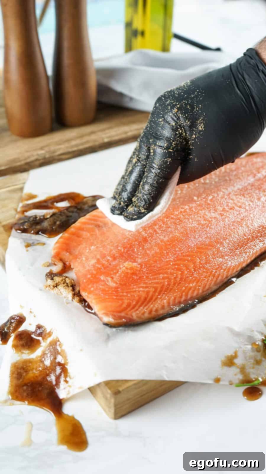 Salmon being wiped down after refrigeration