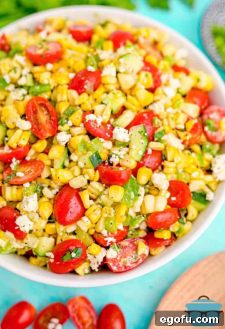 Finished Summer Corn Salad in white bowl overhead photo