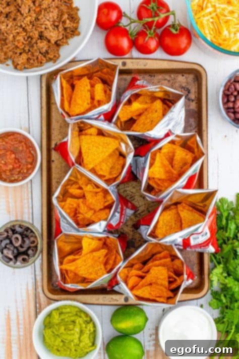 Open bags of Doritos on sheet pan
