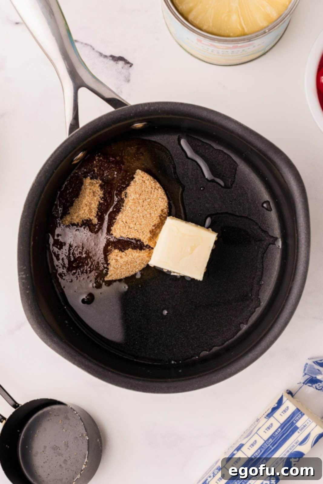 Sunshine Pineapple Bundt Cake 5 Butter, brown sugar, and pineapple juice melting together in a saucepan, forming the caramel base.