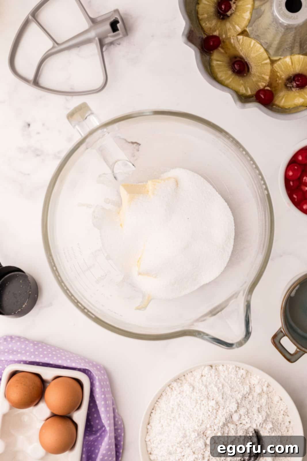 Sunshine Pineapple Bundt Cake 9 Creamed butter and granulated sugar in a glass stand mixer bowl.
