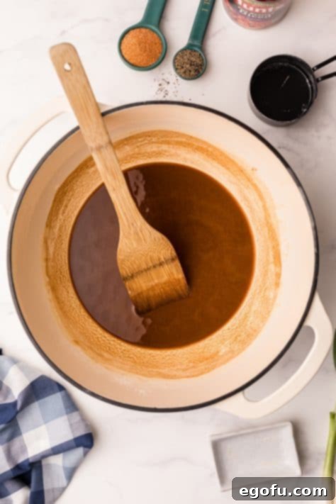 A dark roux in bottom of dutch oven