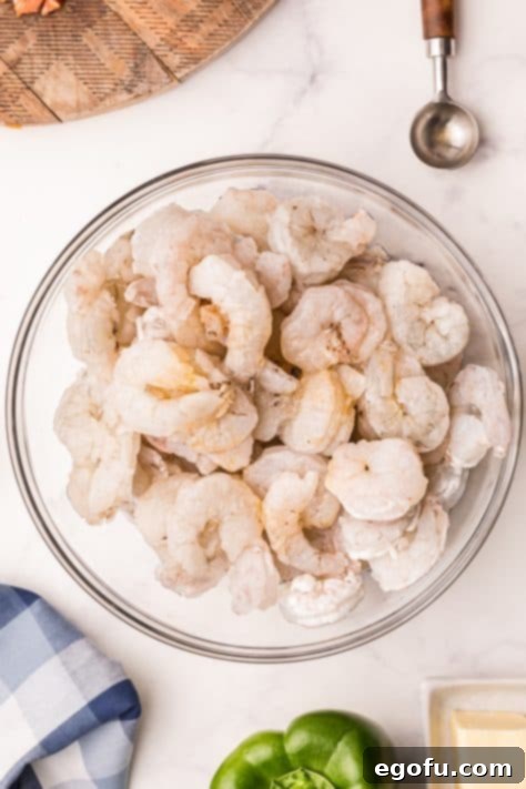 Shrimp and crab boil added to bowl