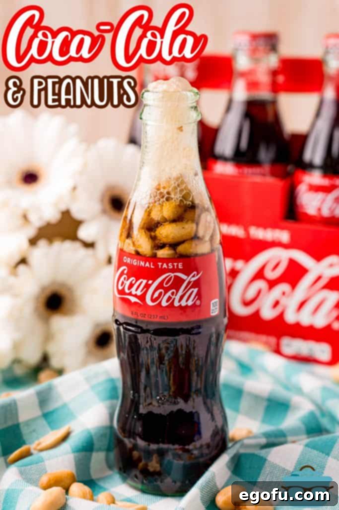 The Classic Cola Crunch 3 Close-up shot of a Coca-Cola bottle with peanuts, against a soft, rustic background