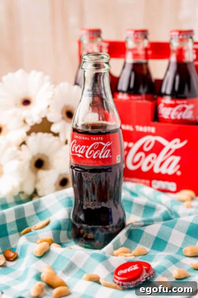 The Classic Cola Crunch 4 The two essential ingredients: a Coca-Cola bottle and a bag of salted peanuts