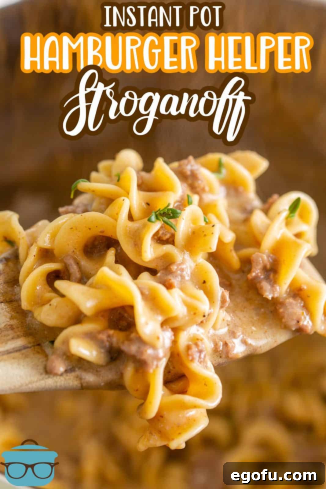 Instant Pot Creamy Beef and Noodle Stroganoff 3 Close up of spoon holding up some Instant Pot Hamburger Helper Beef Stroganoff showing noodles and creaminess Pinterest image.