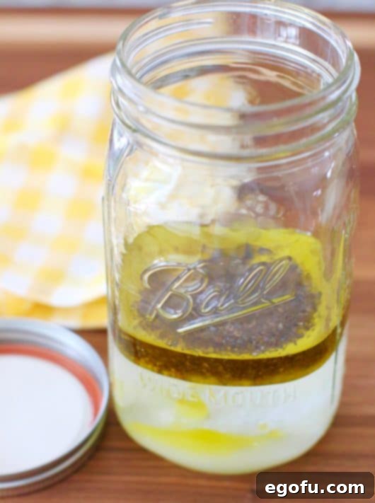 marinade ingredients shown in a large mason jar.