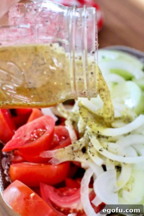 pouring marinade over sliced vegetables in a bowl.