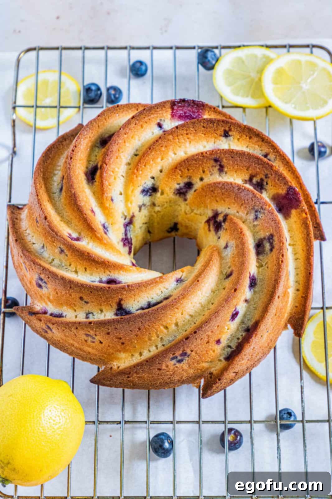fully baked cake, removed from bundt pan and cooling on wire rack.