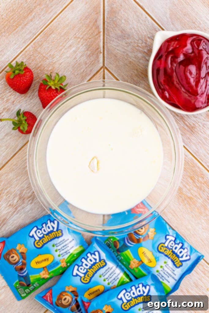 The Wandering Strawberry Cheesecake 5 Pudding and milk in clear bowl