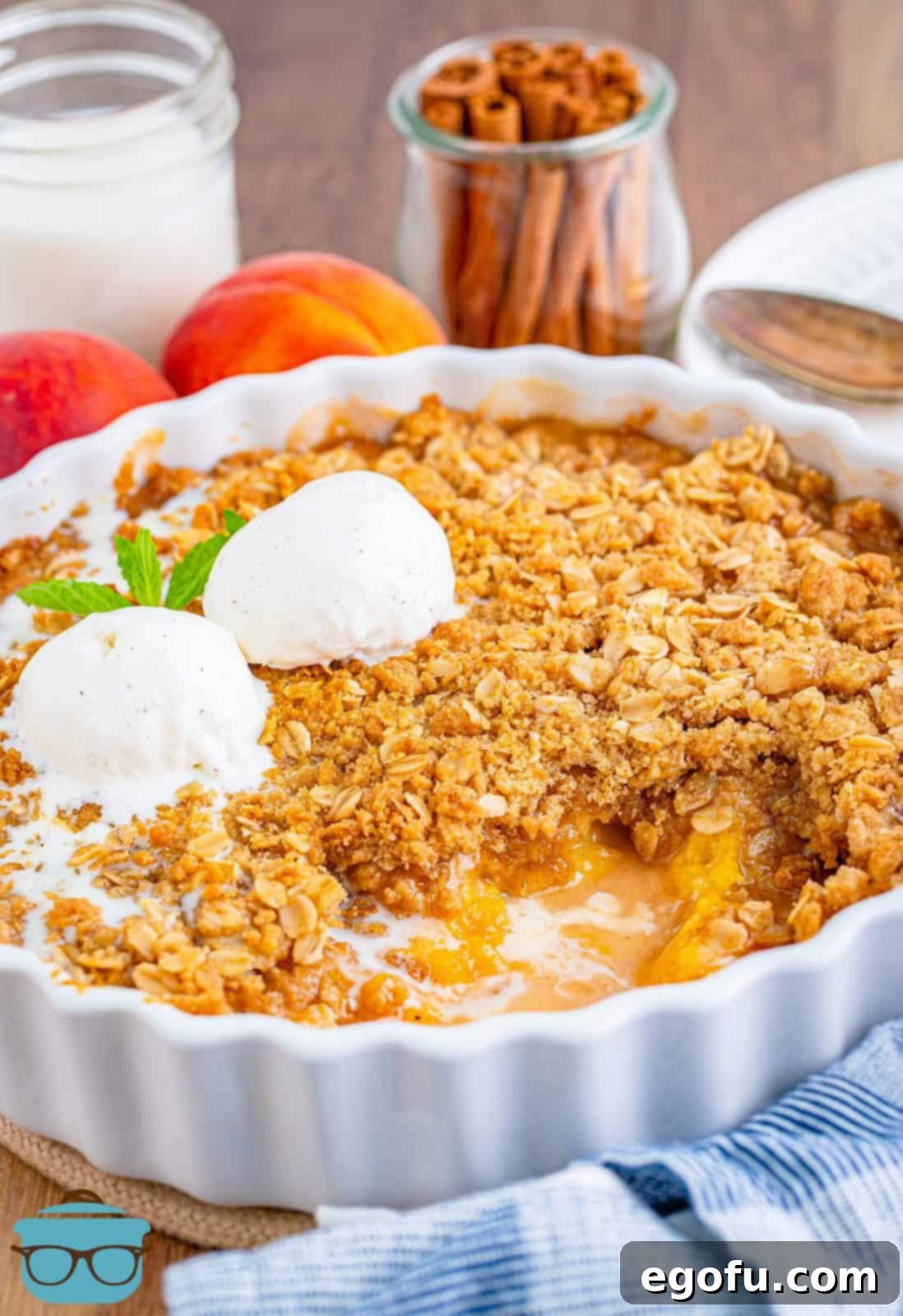 Golden Peach Crumble 2 Fresh Easy Peach Crisp in baking dish with some of the crisp removed.