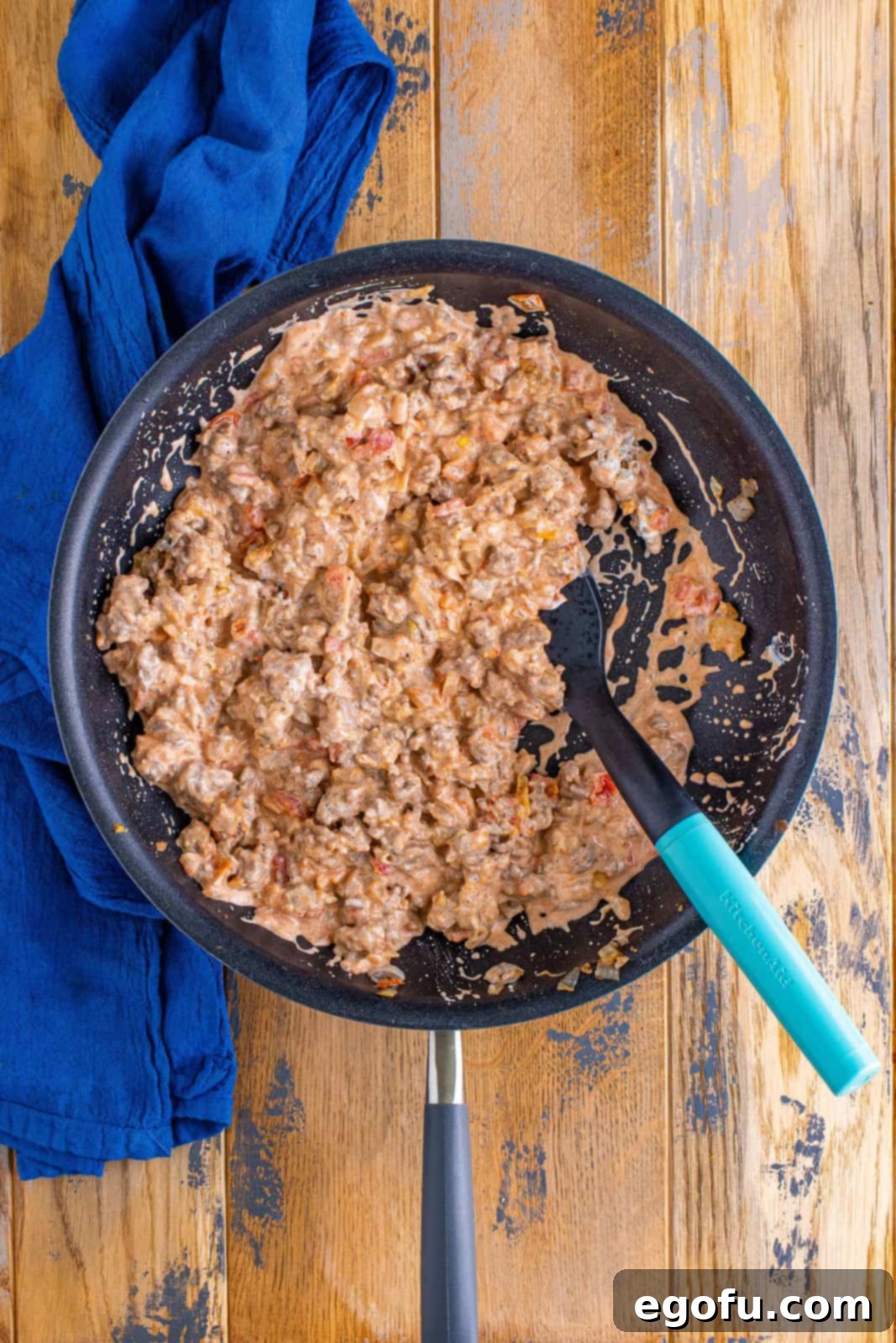 Effortless Taco Bake 10 taco pie beef mixture full cooked.