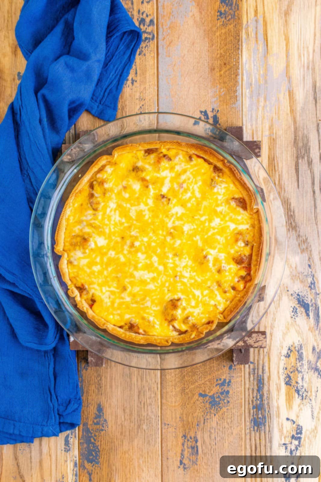 Effortless Taco Bake 12 melted cheese on top of beef taco pie filling.