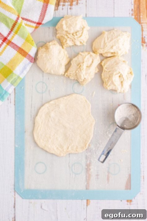 Piece of dough flattened out.