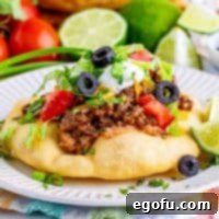 Square image of a topped Fry Bread Taco.