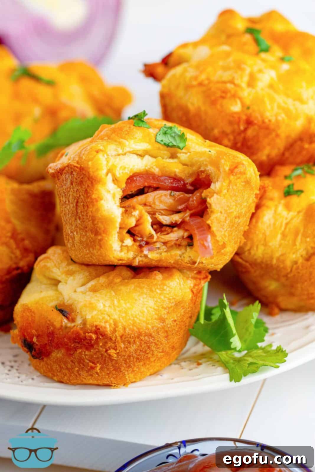 Smoky BBQ Chicken Pizza Bites 15 Stacked BBQ Chicken Pizza Cups with bite taken out of one.