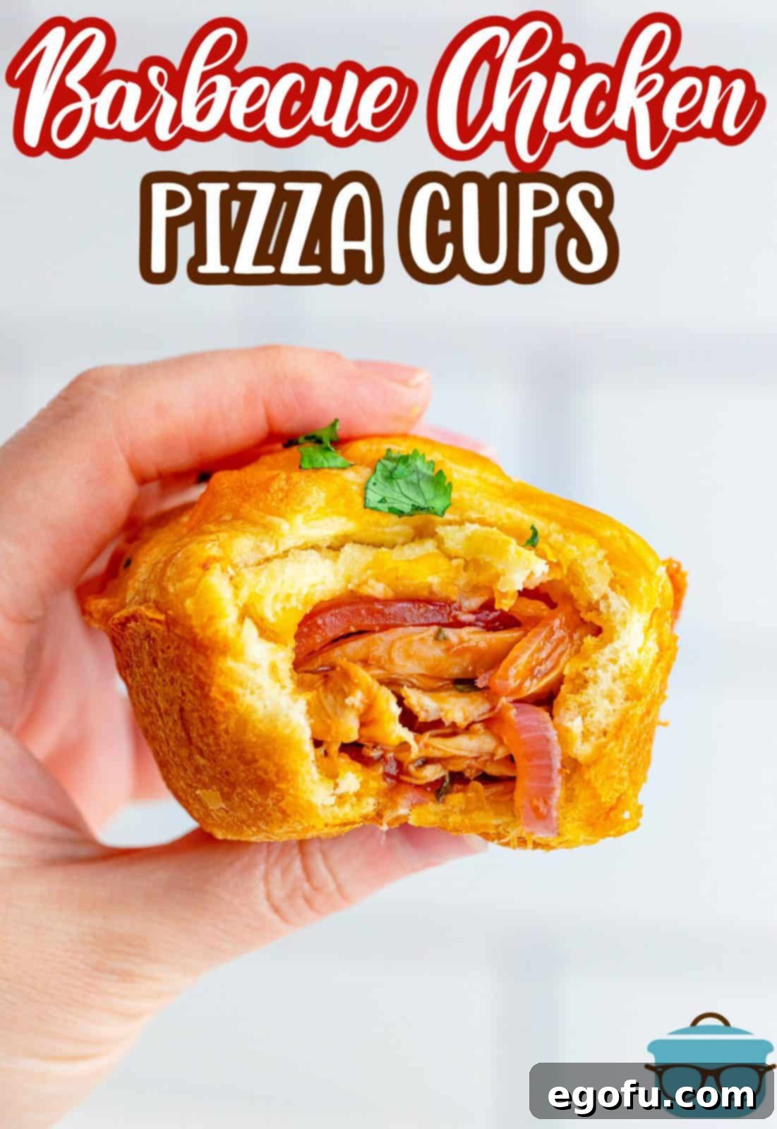 Smoky BBQ Chicken Pizza Bites 3 Pinterest image of hand holding one BBQ Chicken Pizza Cup with bite taken out sowing filling.