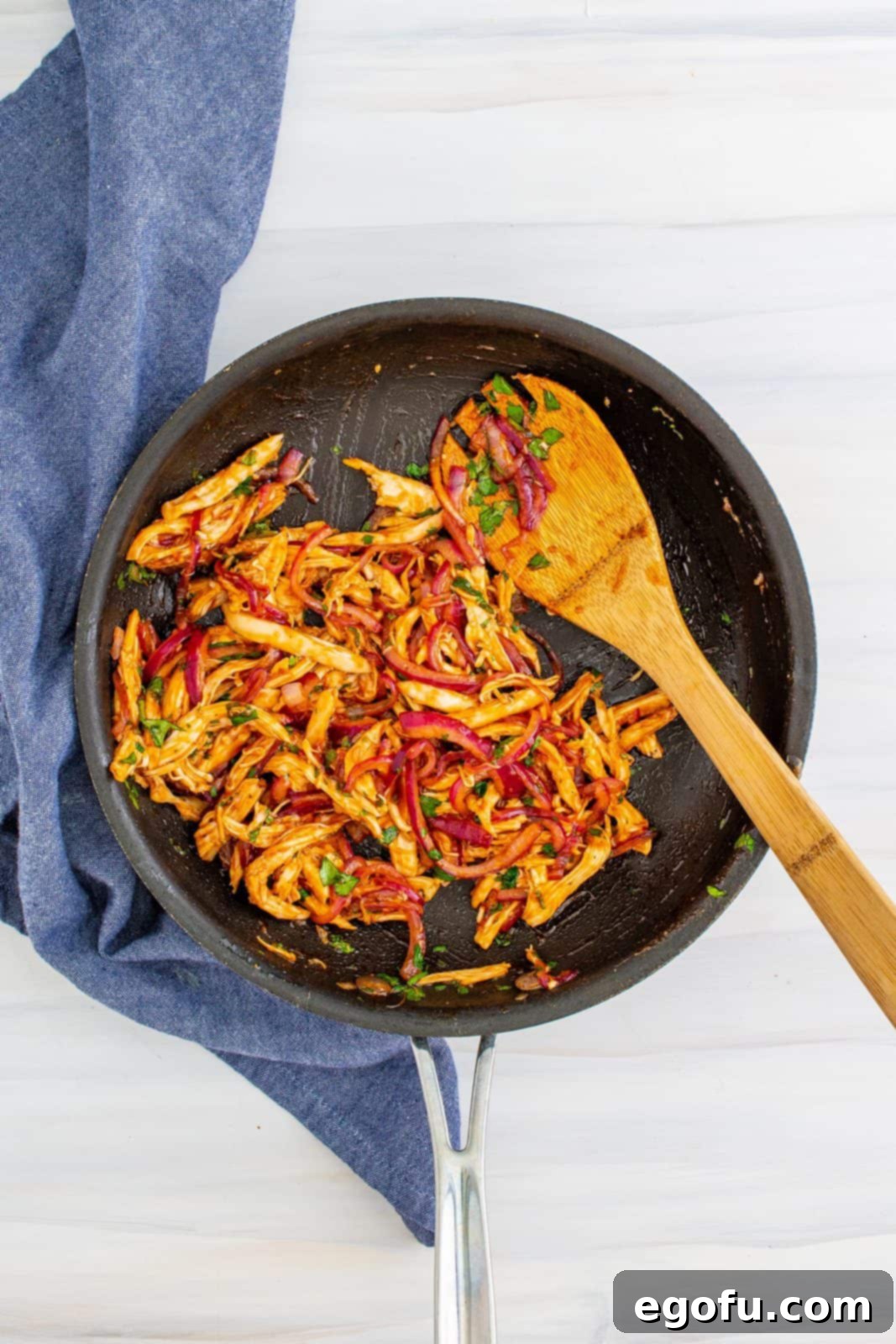 Smoky BBQ Chicken Pizza Bites 7 Chicken and bbq mix all stirred together in a skillet.