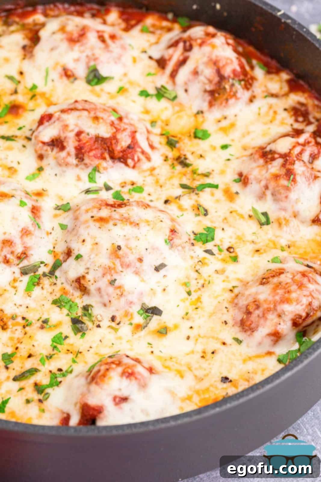 Easy Cheesy Skillet Meatballs 7 Finished Meatball Parmesan Skillet, fresh out of the oven with melted, bubbly cheese.