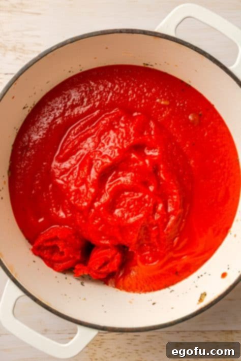 The start of Marinara Sauce in a pot.